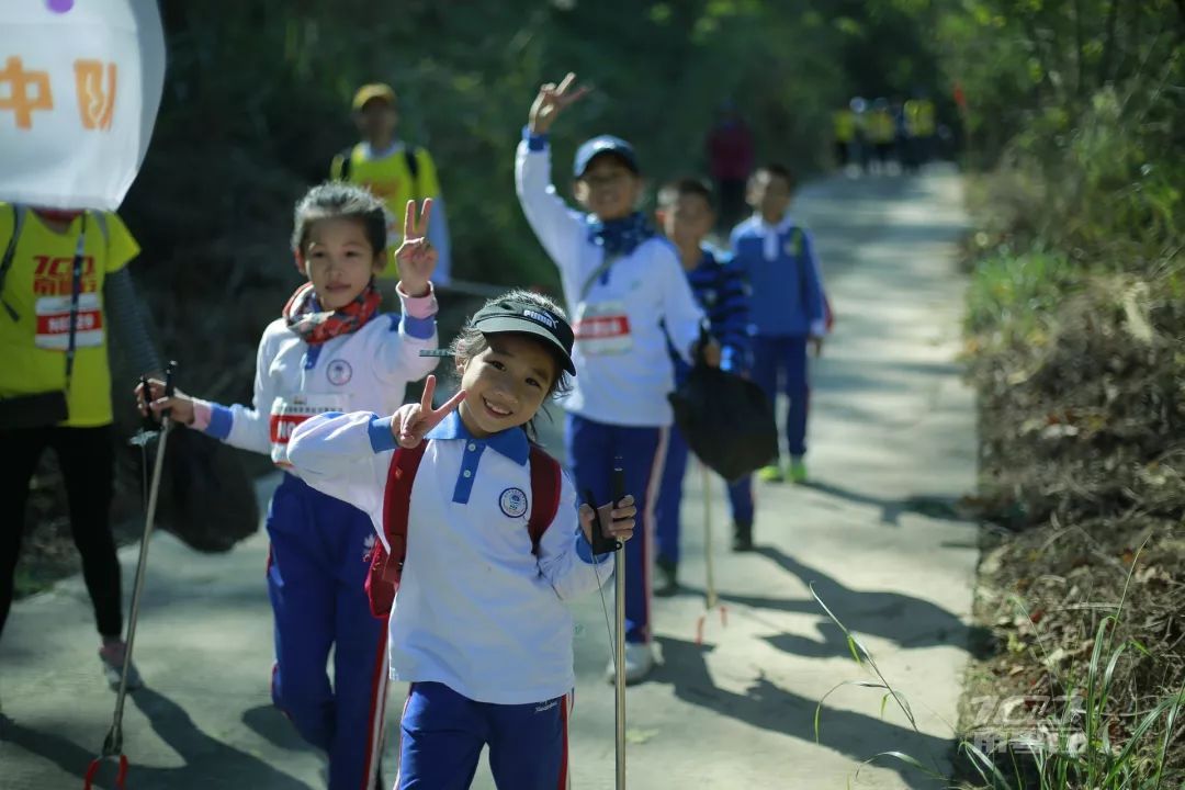Kids walking the route with their parents