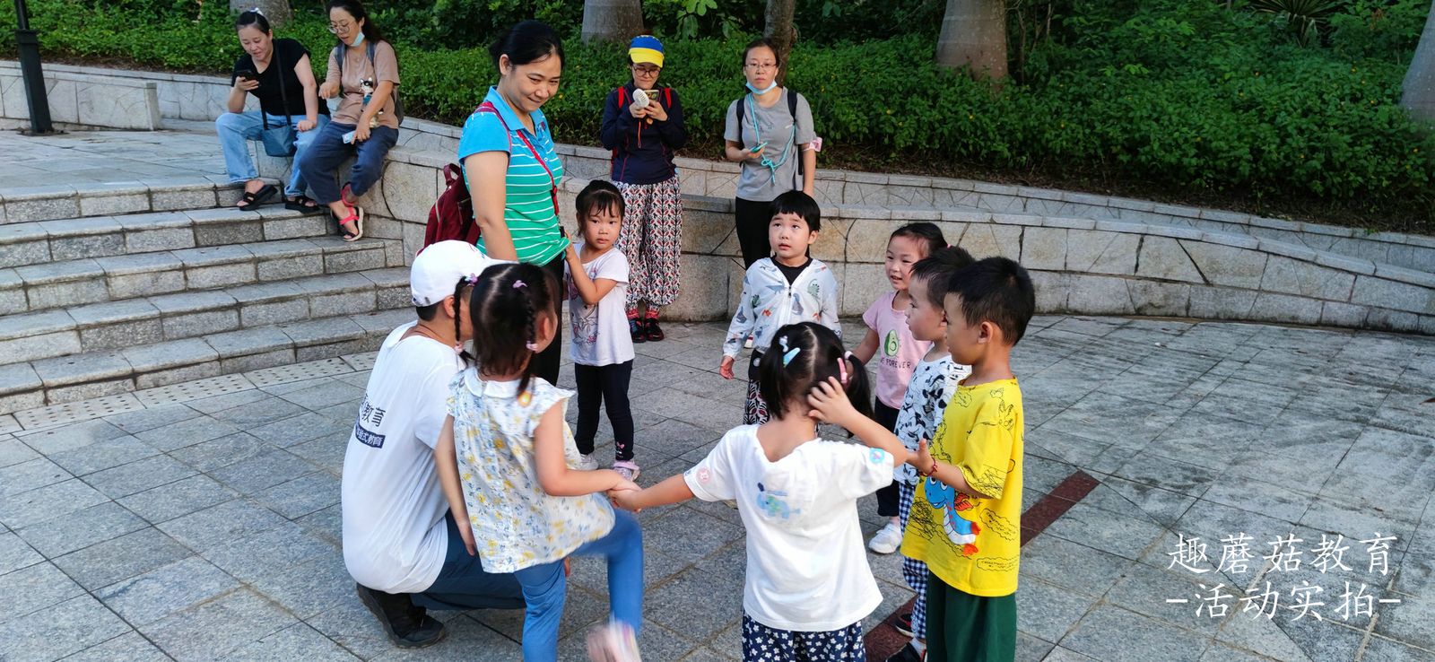 Kids gathered on a bridge for the night walk briefing